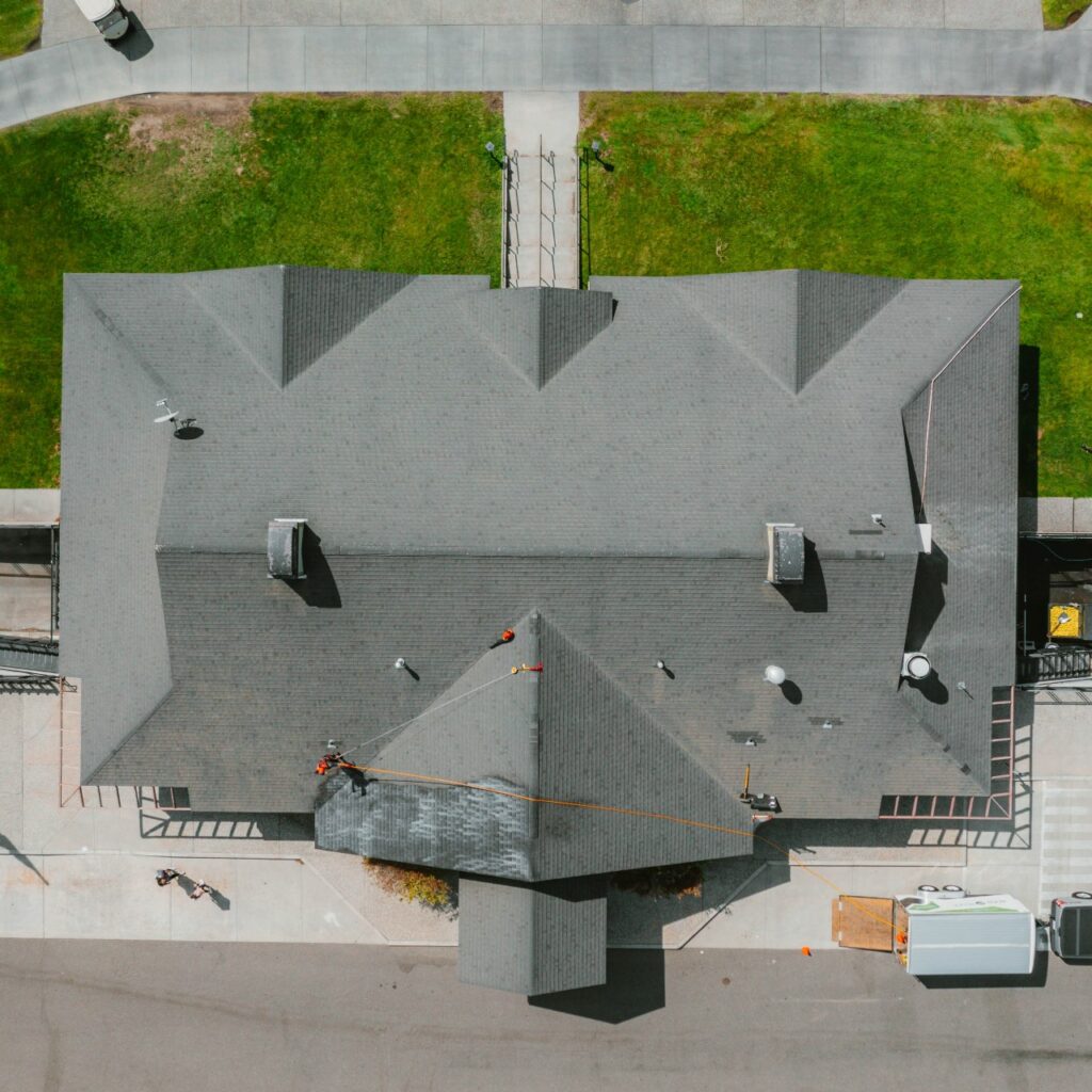 the top view a house roof - best roofing materials RoofMaxx Tri-Cities