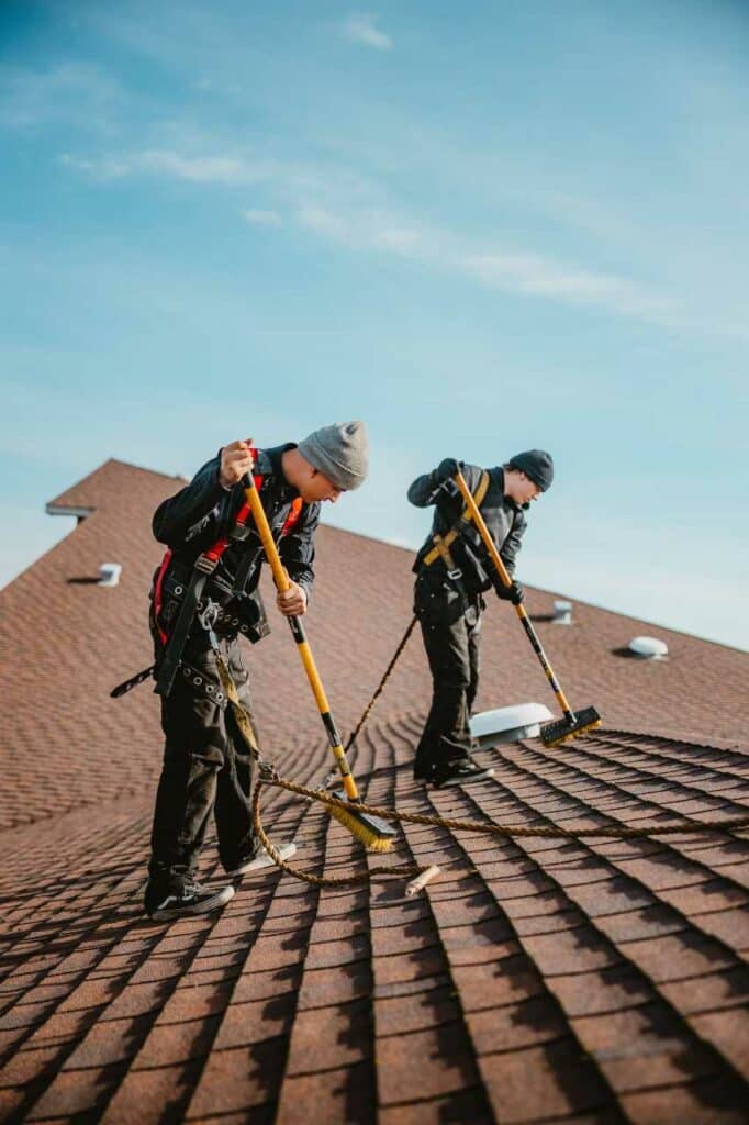 cleaning the roof - roof replacement or shingle replacement Roofmaxx of Tri-Cities