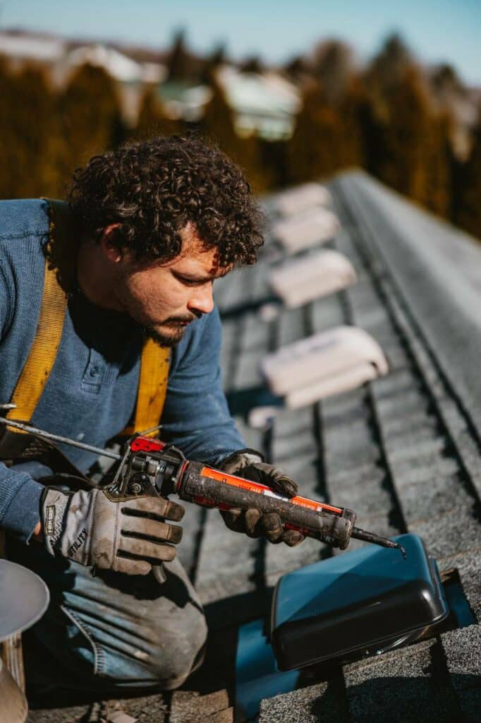 Roof Maxx of Tri-Cities crew installing solar roof vents