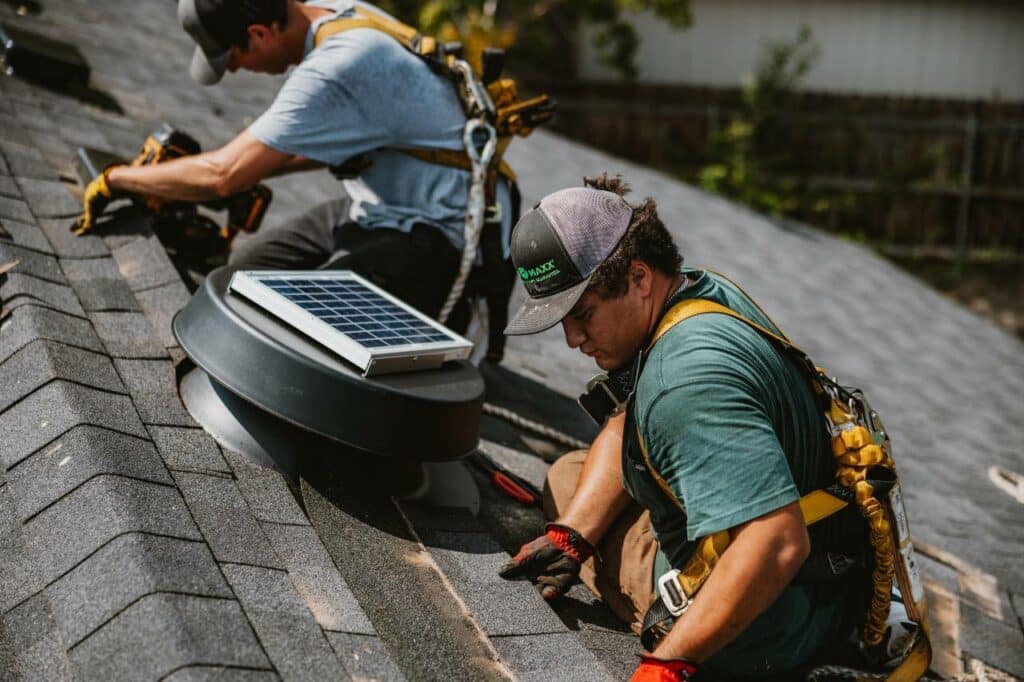 installing solar fans in the summer by Roof Maxx of Tri-Cities